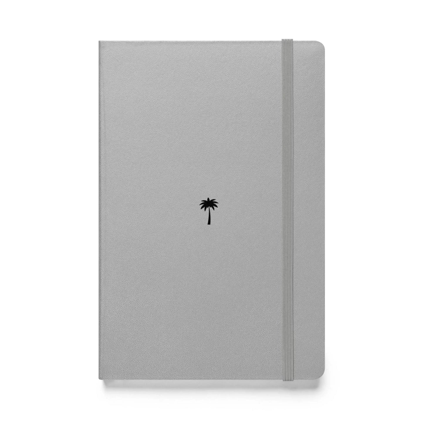 A gray Mambí notebook featuring a small black palm tree icon centered on the cover, with an elastic band closure on the right side.