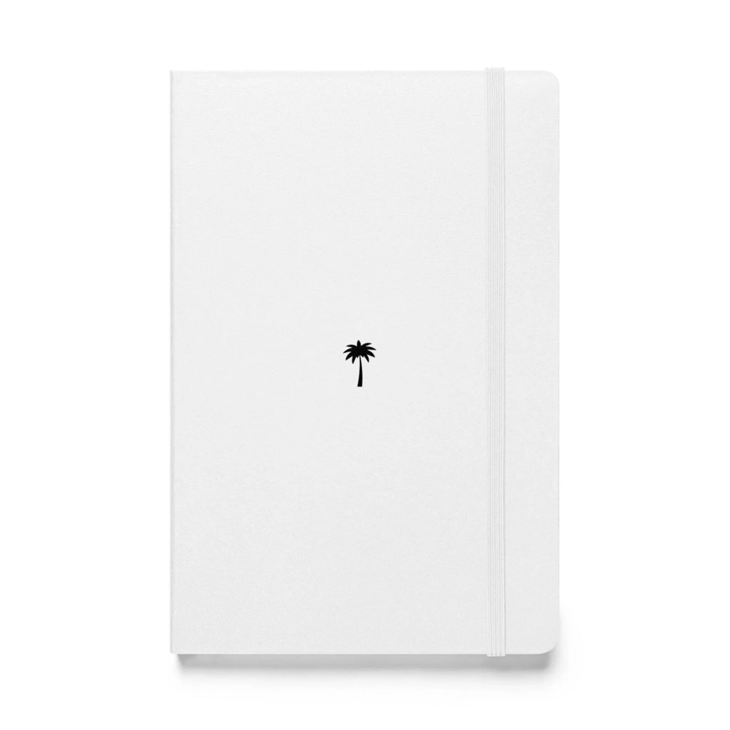 A white Mambí notebook with an elastic band and a small black palm tree icon centered on the front cover.