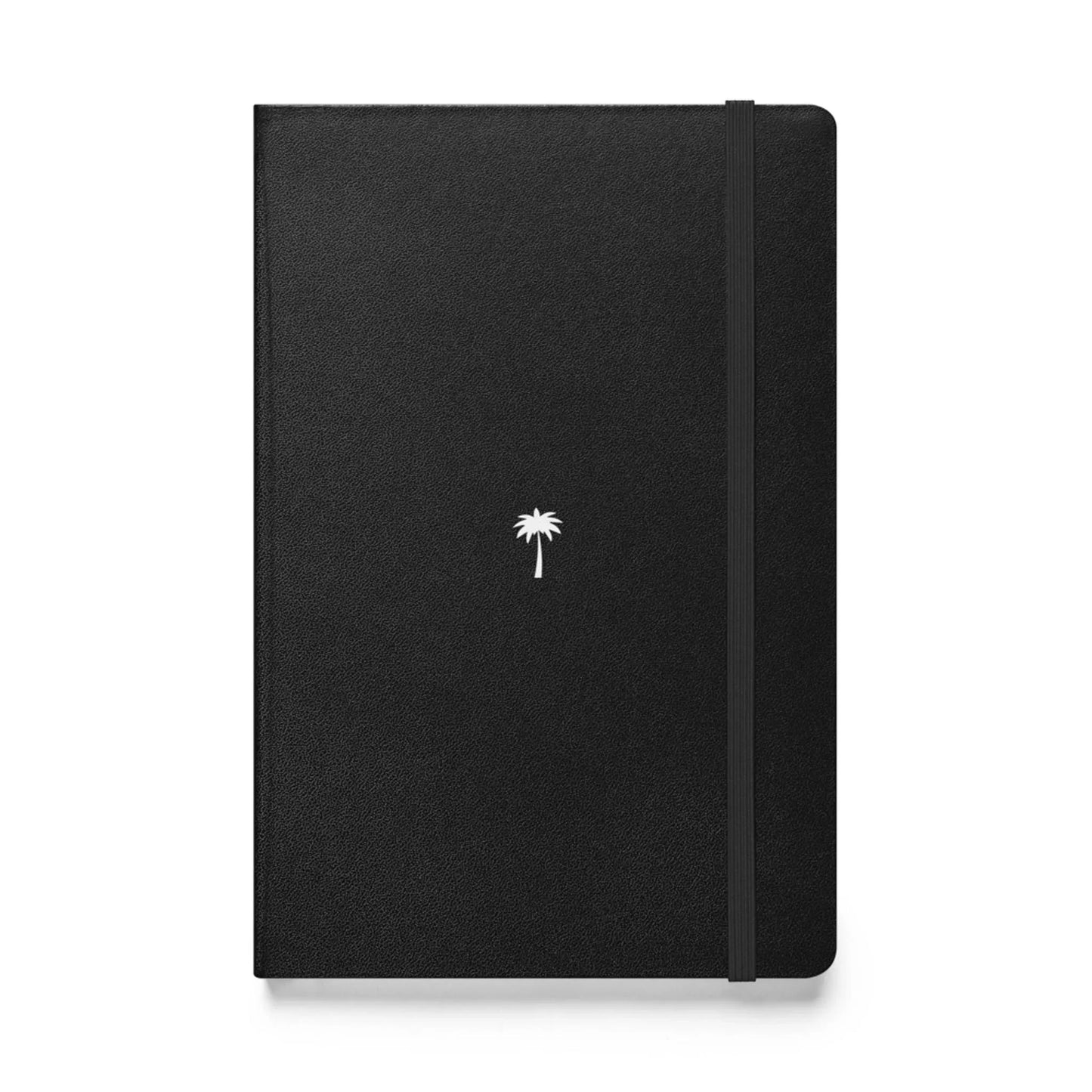 A black hardcover Mambí notebook featuring a small white palm tree icon in the center and an elastic band on the right side to keep it closed.