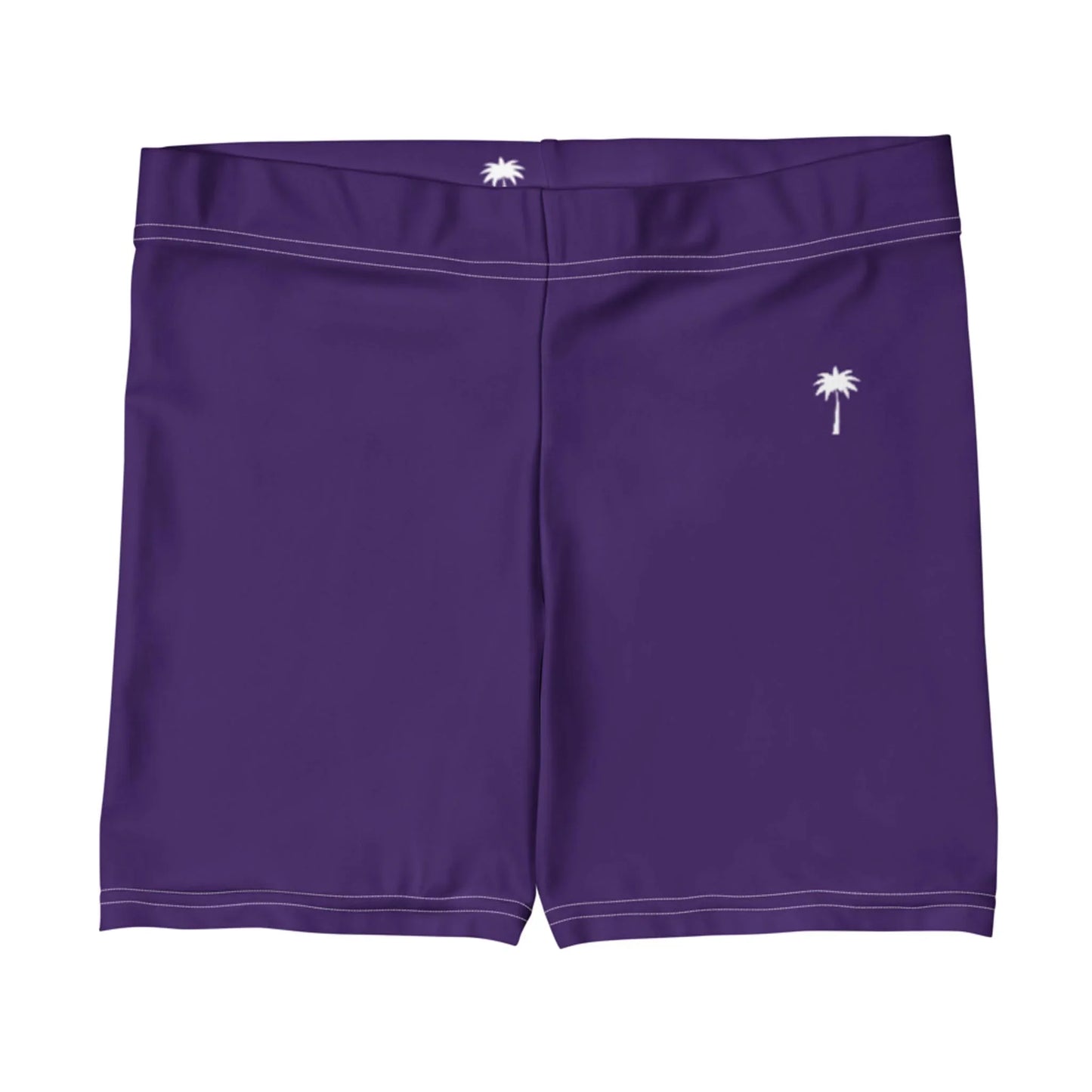 A pair of purple Mambí swim trunks with white stitching and small white palm tree logos on the front left leg and center back of the waistband.