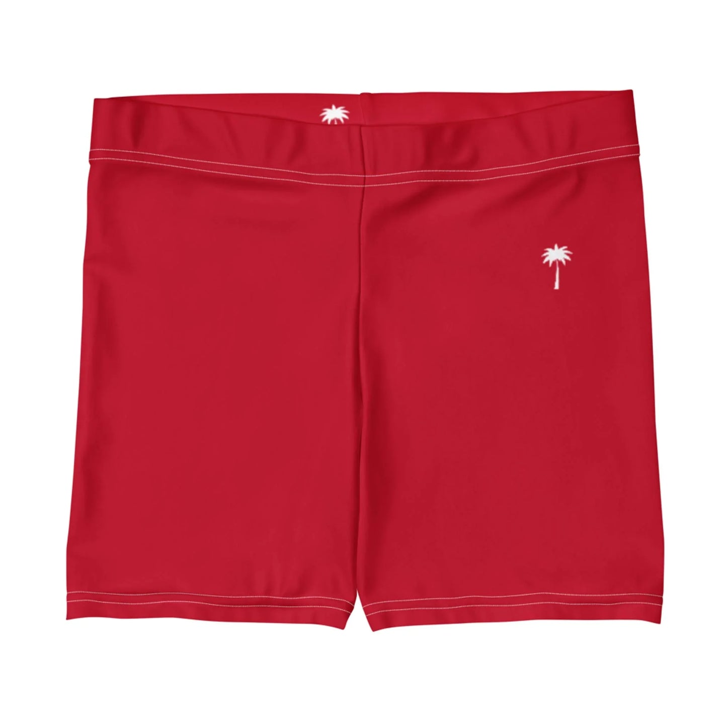 Red swim trunks featuring a white Mambí palm tree logo on the front left side and a smaller logo on the back waistband, accented with white stitching along the seams.