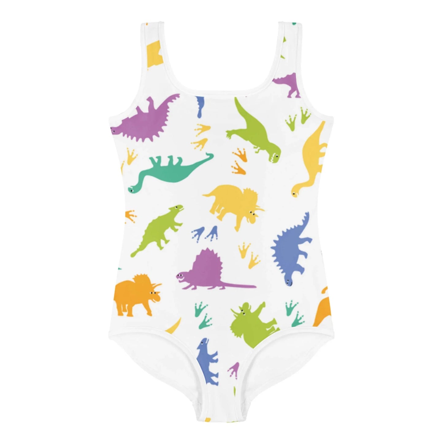 A white one-piece swimsuit by Mambí featuring a colorful dinosaur pattern with green, yellow, orange, blue, and purple dinosaurs and matching dinosaur footprints.