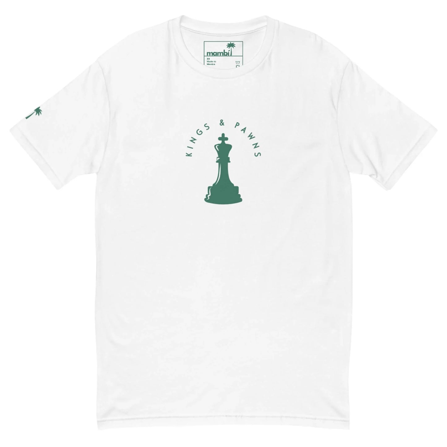 White t-shirt featuring a green chess king silhouette at the center with the text Kings & Pawns curved above it; a small green palm tree and subtle Mambí detail on the left sleeve.