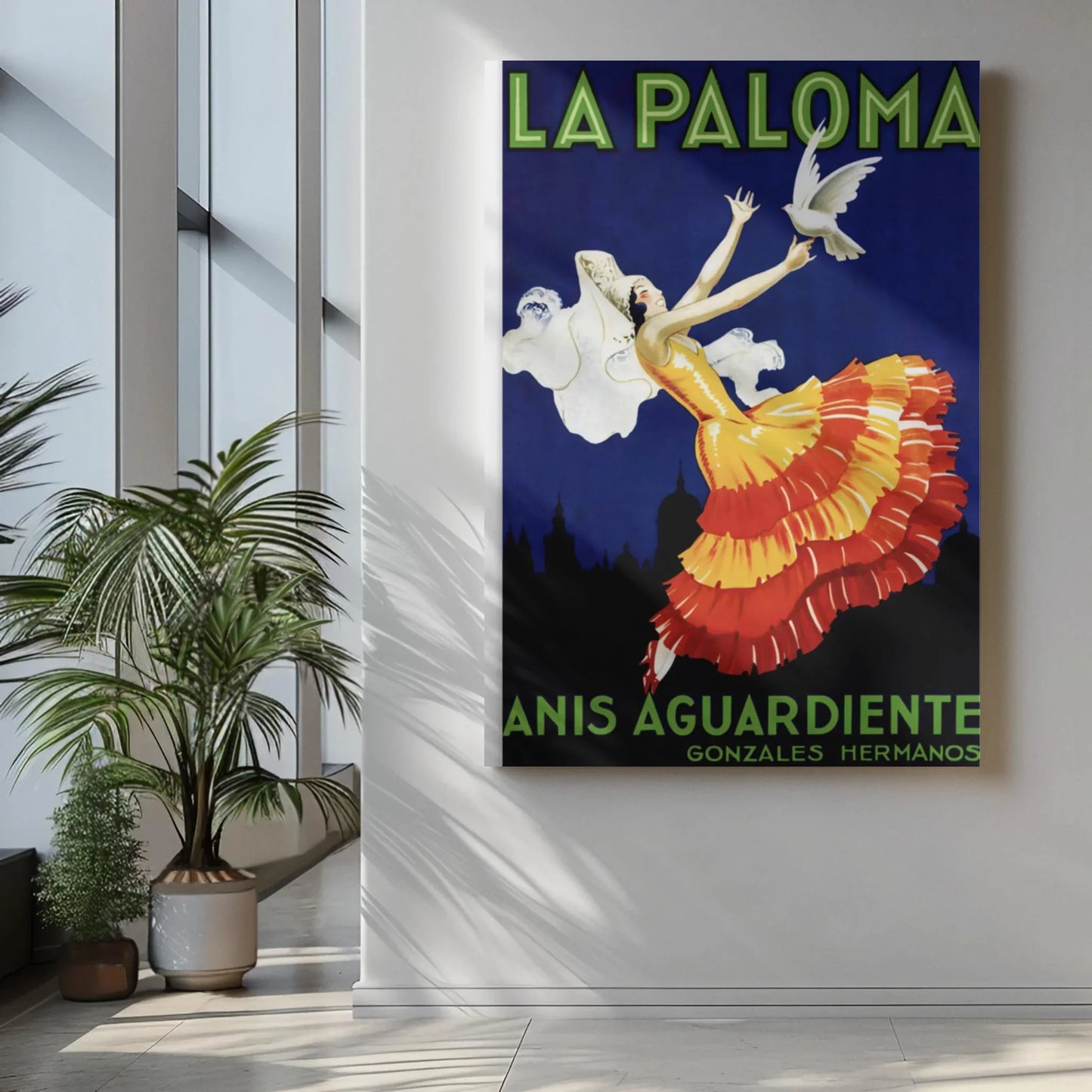 The La Paloma reprinted vintage poster by Printful, printed on premium luster paper (24x36), features a woman in a red and yellow dress dancing with a white dove beside the text LA PALOMA ANIS AGUARDIENTE GONZALES HERMANOS—perfect for modern decor.