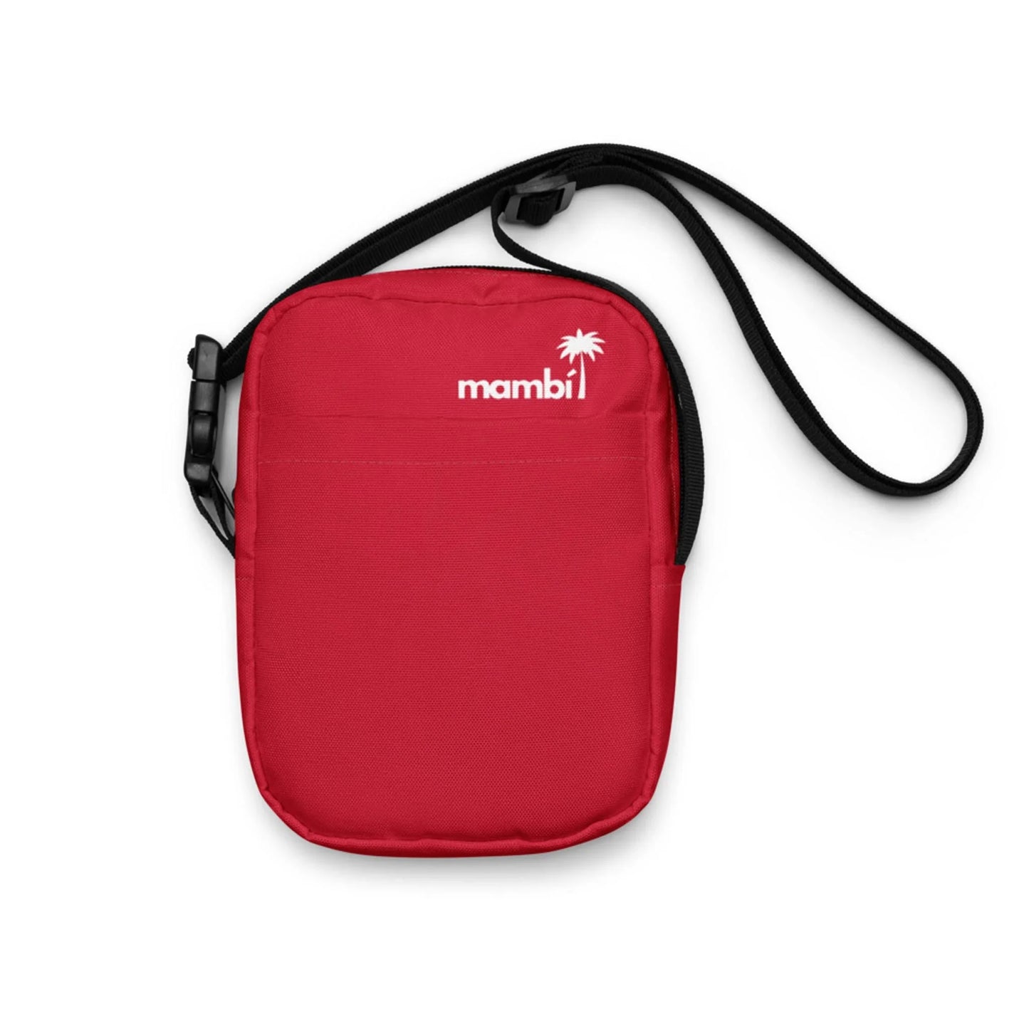 A small red crossbody bag with a black adjustable strap and a white Mambí logo featuring a palm tree in the top right corner of the front side.
