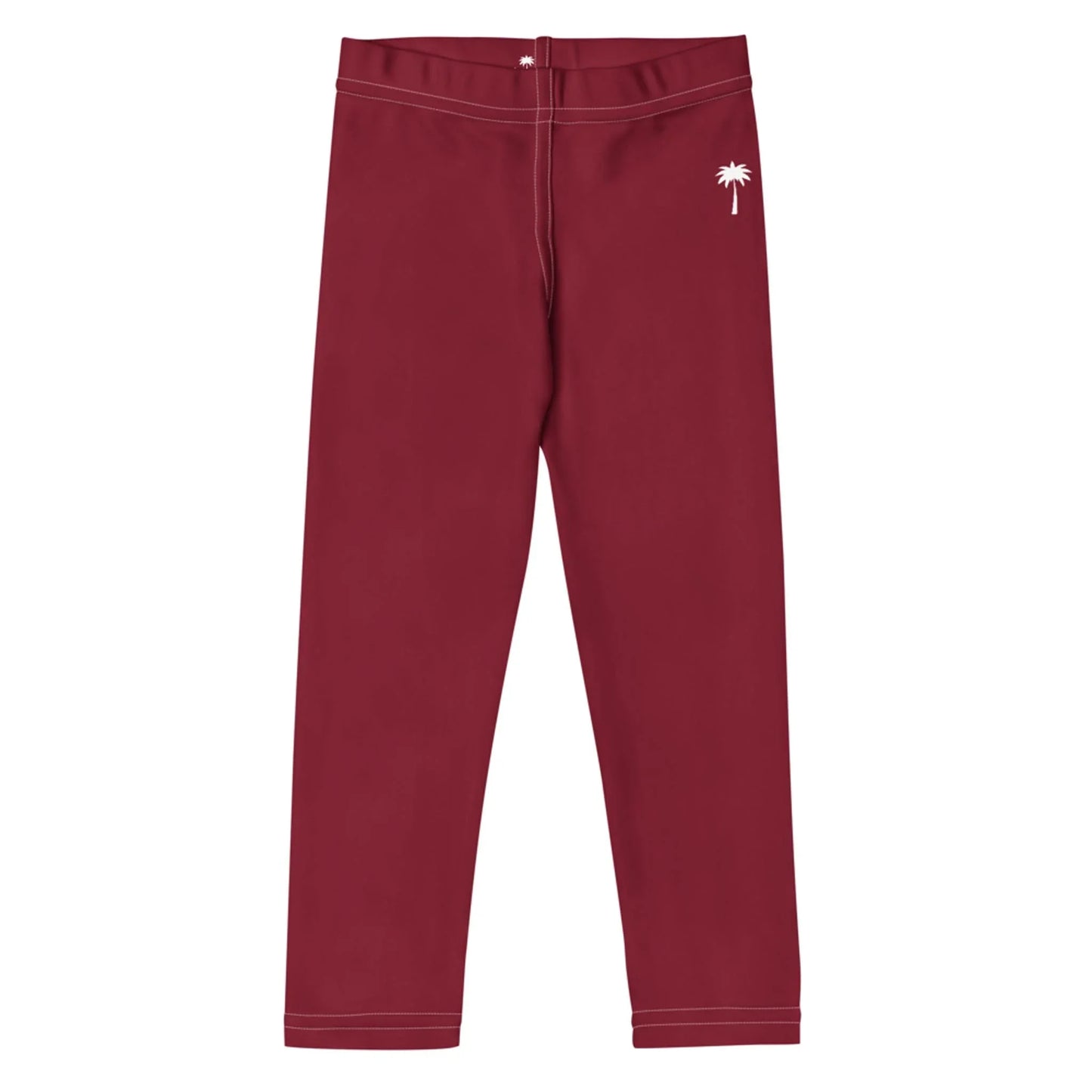 Burgundy leggings with white stitching and a small white palm tree graphic on the upper left hip. Featuring a Mambí-inspired, simple fitted design and an elastic waistband.