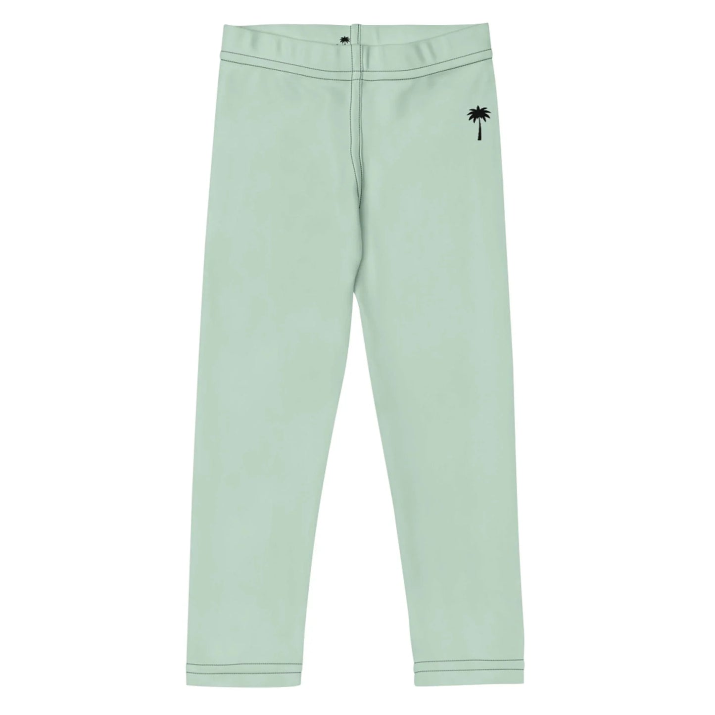 Light green Mambí leggings with a black palm tree graphic on the left hip and a single button at the waistband, laid flat on a white background.