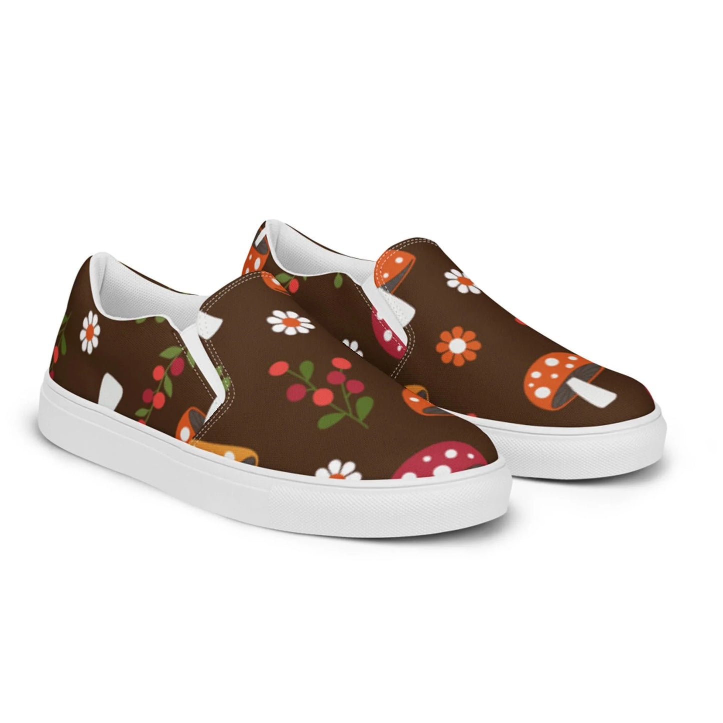The Mario Handmade Slip-On Canvas Shoes for men by Printful feature a vibrant mushroom, flower, and leaf pattern on brown canvas with white soles and lining—perfect for a bold, fun fashion statement.