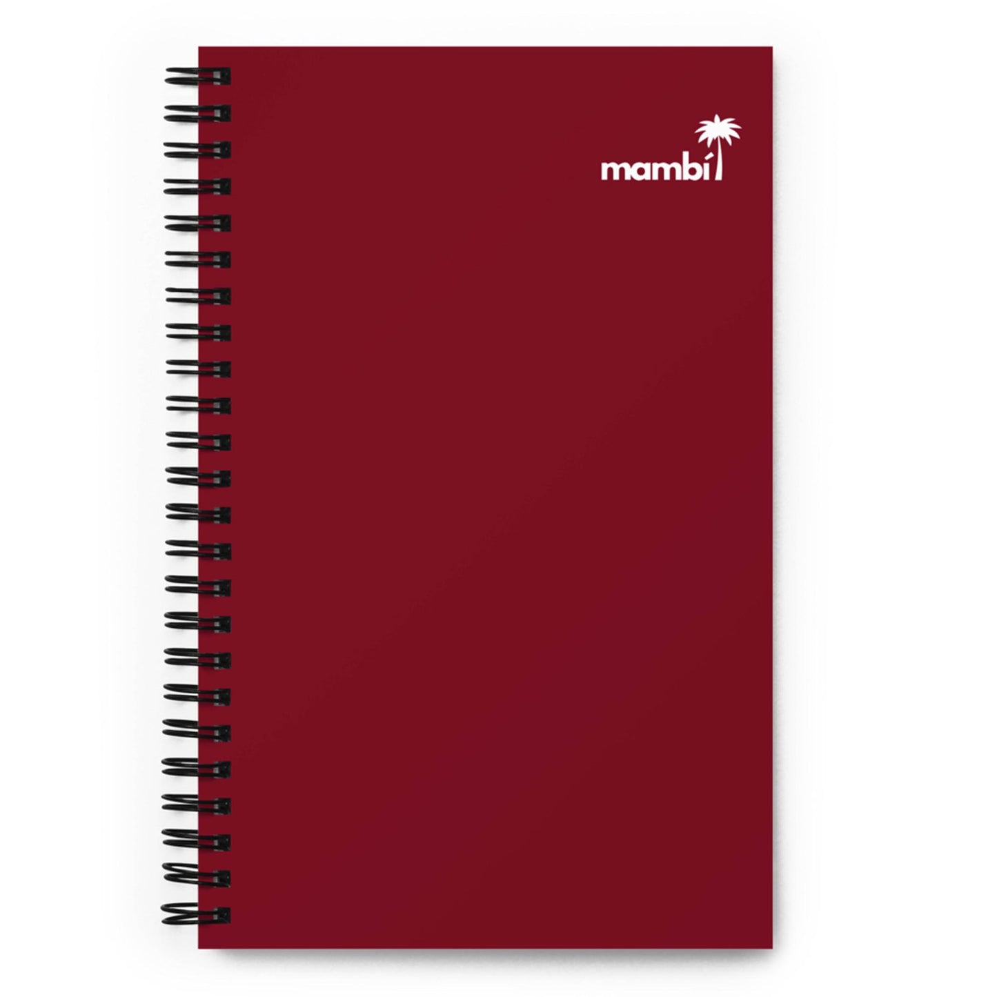 A maroon spiral notebook with a small white palm tree and the word “mambi” in the top right corner of the cover, perfect as a custom wire-bound notebook or a stylish dotted paper notebook for your notes.