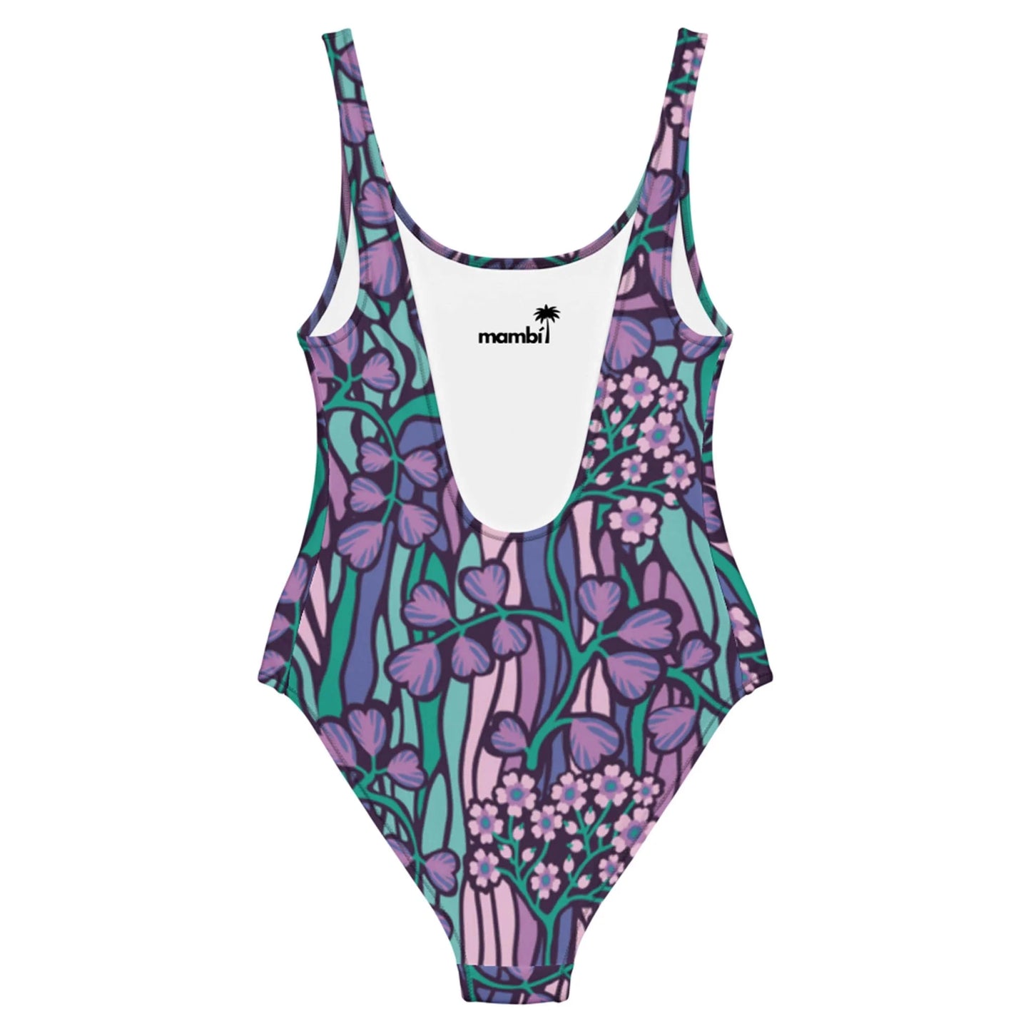 The Micaela One-Piece Swimsuit by Printful features a chic silhouette, scoop neckline, and vibrant floral print in purple, pink, teal, and green on stretchy fabric. The inner label displays “mambi” with a palm tree logo above it.
