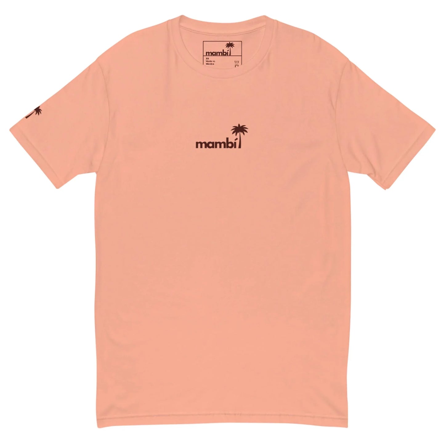 The No Me Jodas Fitted Graphic Tee by Printful is a light pink, soft cotton mens shirt. It features mambi and a black palm tree graphic on the chest, plus a unique palm tree design on the left sleeve.