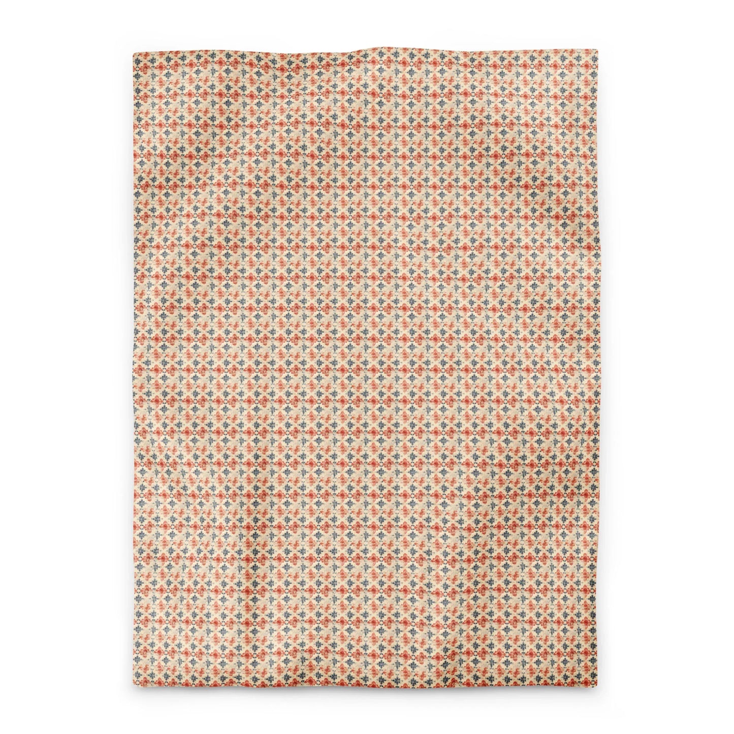 A rectangular fabric with a repeating geometric pattern in red, green, and beige colors evokes classic Portuguese design. The slightly wavy edges accentuate its charm, resembling the elegance of luxury hotel bedding. Laid flat on a white background.