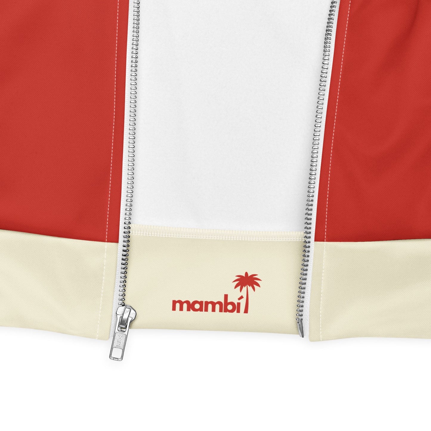 Close-up of a varsity bomber jacket featuring red, white, and beige panels with a silver zipper. The beige section has the word mambi in red lowercase letters next to a small palm tree graphic and showcases premium stitching.