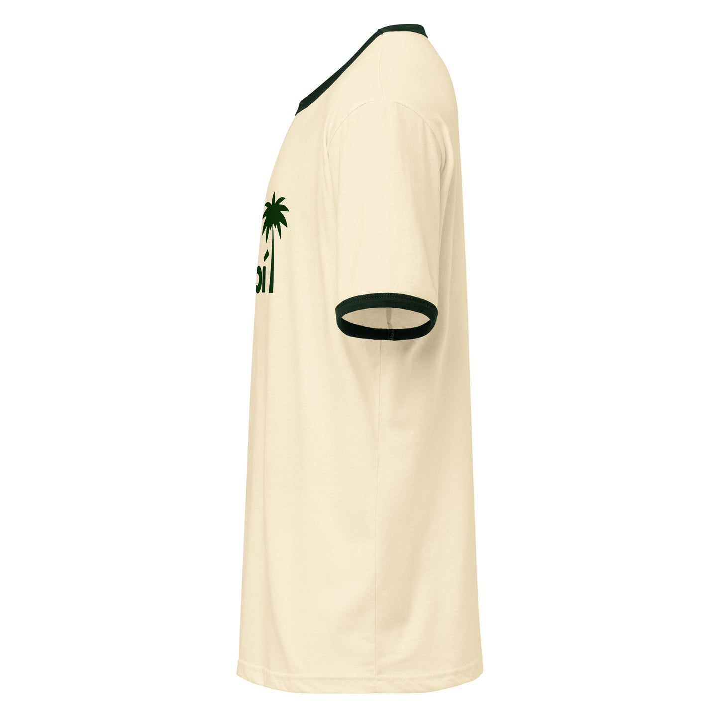 Side view of a beige retro t-shirt with dark green ribbed collar and sleeve cuffs. Made from lightweight cotton, this relaxed fit tee features a small green palm tree and partial green text on the upper chest area.