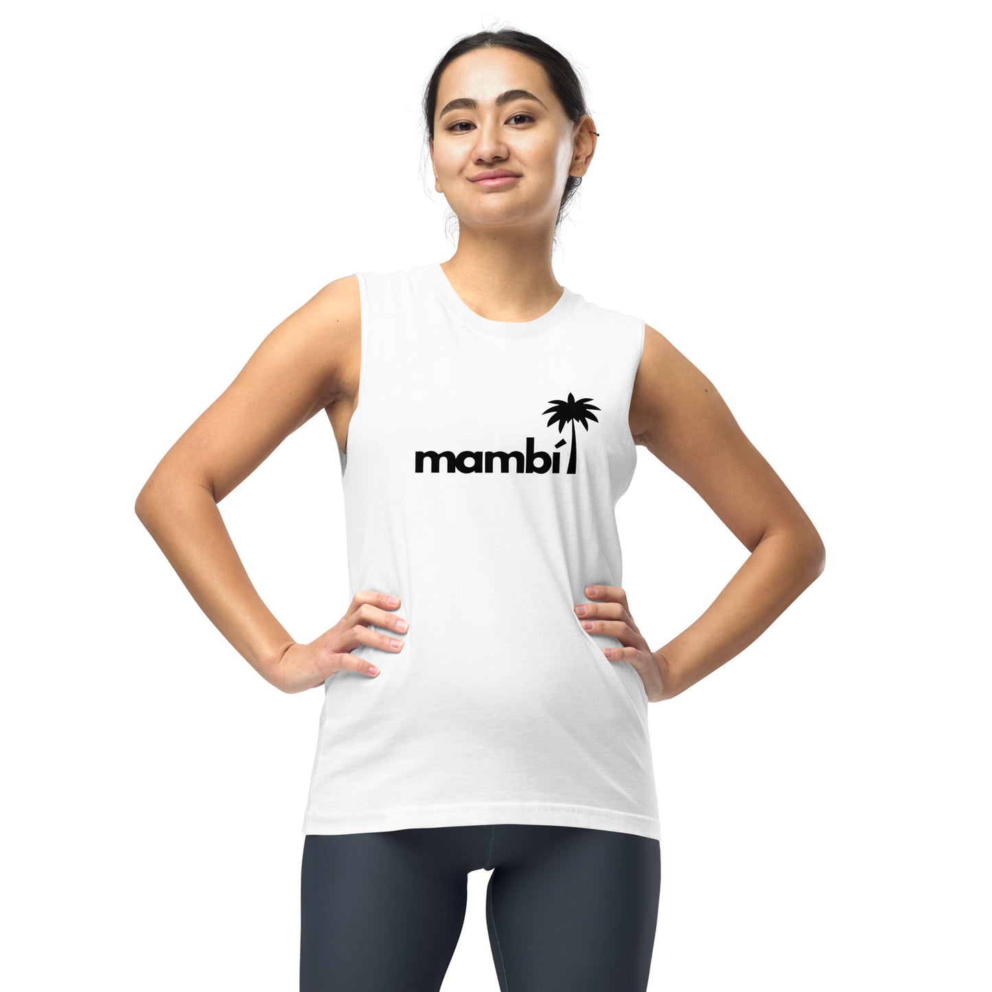 Smiling woman wearing a relaxed fit sleeveless tank with the word “mambí” and a palm tree graphic on the front, standing confidently with hands on hips against a plain white background—perfect for your next yoga class.