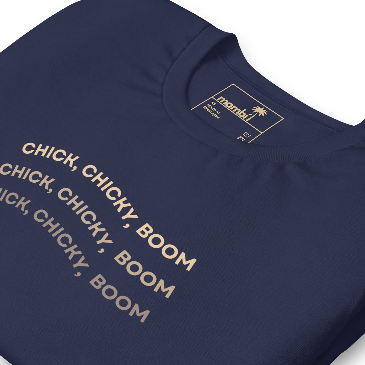 A comfortable cotton navy blue t-shirt with CHICK, CHICKY, BOOM repeated three times in beige capital letters across the chest. This fitted shirt features the brand manly and a palm tree logo on the label.