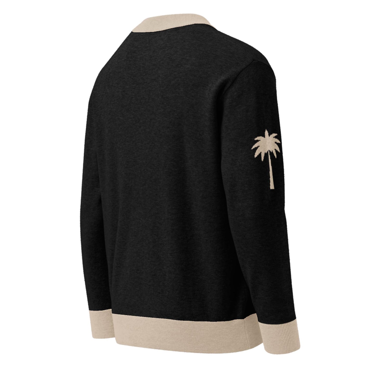 A black two-tone cardigan with beige trim on the collar, cuffs, and hem, featuring a beige palm tree design on the left sleeve. This unisex cardigan is shown from the back.
