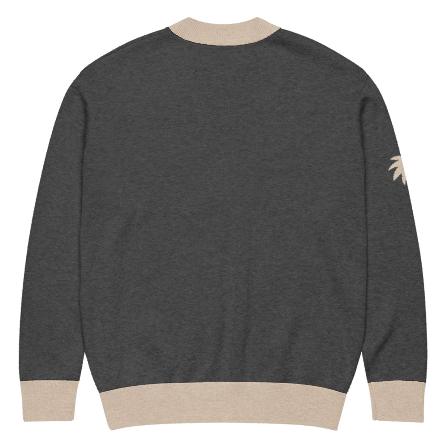 A dark gray two-tone cardigan with light beige ribbed cuffs, hem, and collar. Shown from the back, this unisex cardigan features a small, light beige palm tree design on the upper left sleeve.