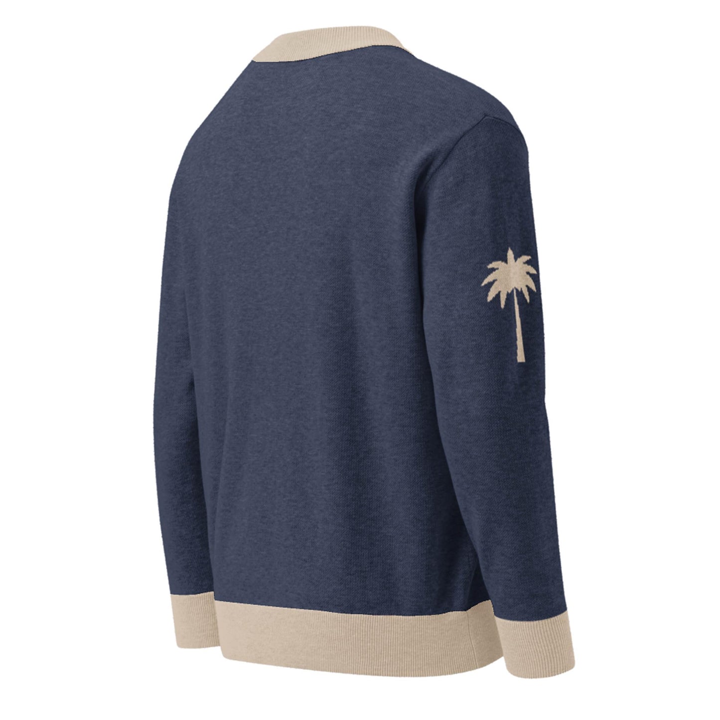 A navy blue jacquard knit sweater with beige cuffs, collar, and hem, featuring a beige palm tree graphic on the left sleeve. The lightweight cardigan is shown from the back.