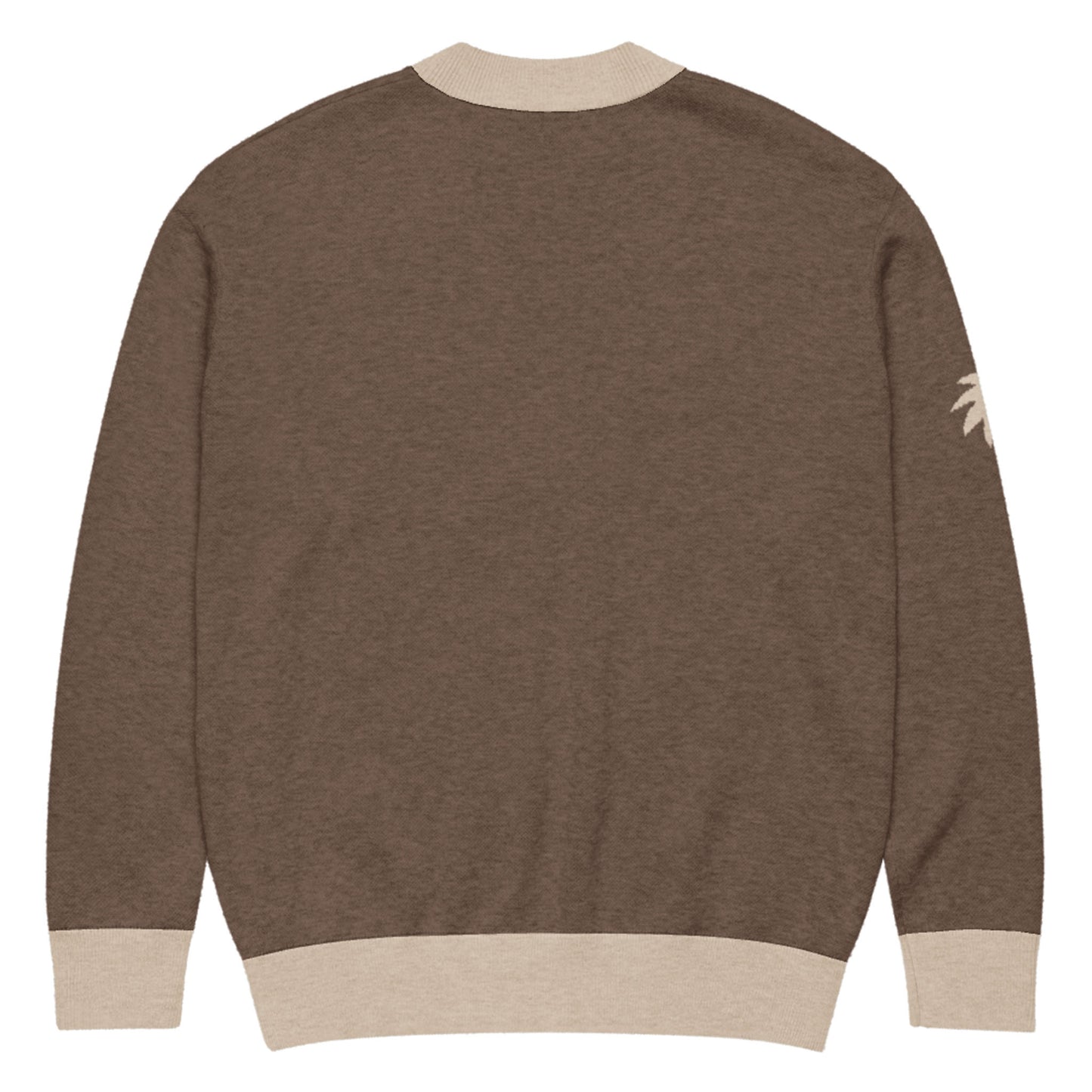A brown jacquard knit sweater with beige ribbed cuffs, collar, and hem, shown from the back. A small beige palm tree design accents the upper part of the left sleeve.