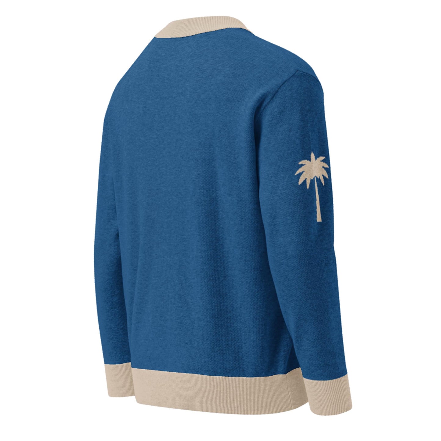 Blue jacquard knit sweater with beige collar, cuffs, and hem, featuring a beige palm tree graphic on the left sleeve. This soft cardigan is displayed from the back and offers a stylish unisex look.