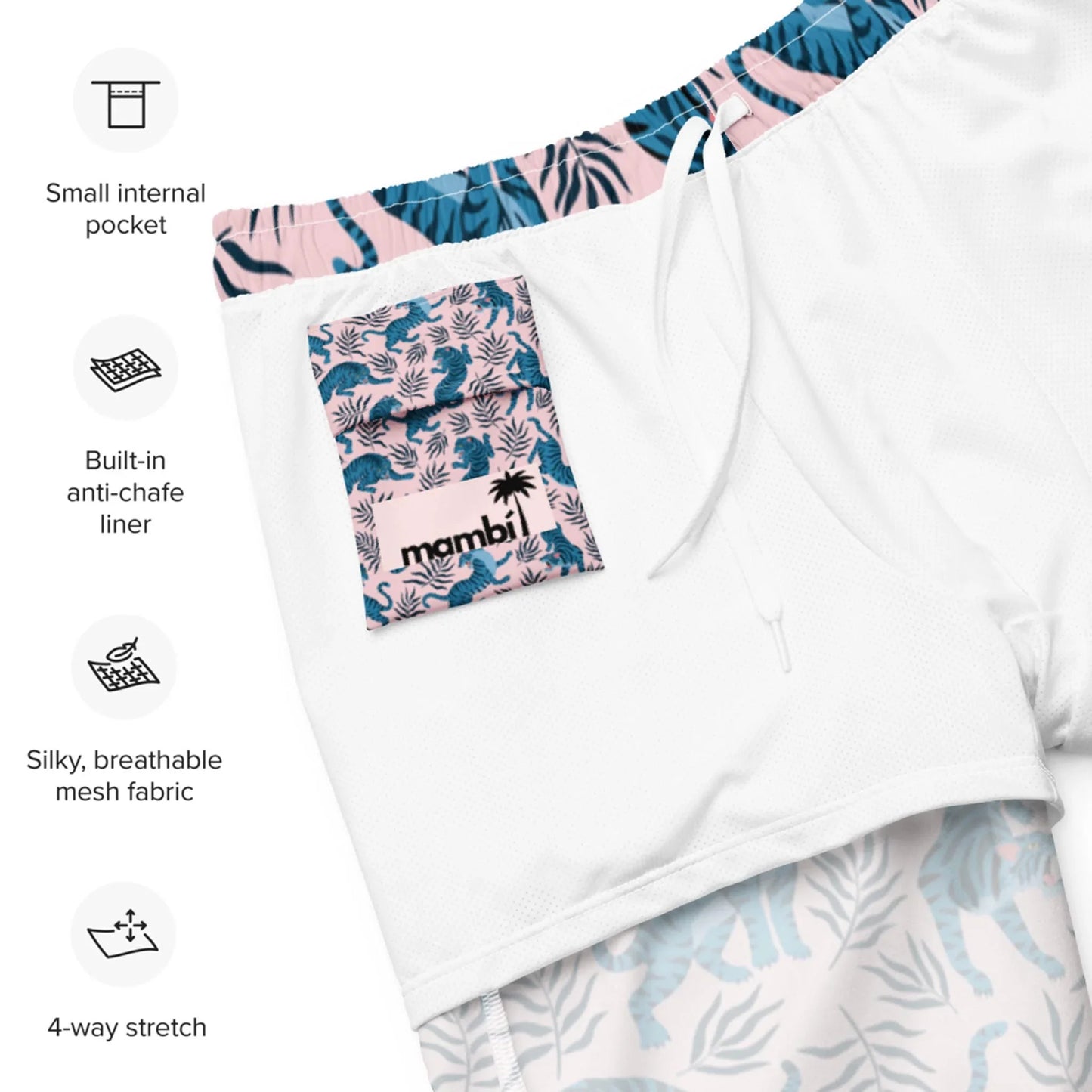 White swim trunks with a blue and pink leaf pattern on the waistband and inner lining. Feature highlights include a small internal pocket, anti-chafe liner, breathable mesh fabric, 4-way stretch, and signature Mambí style.