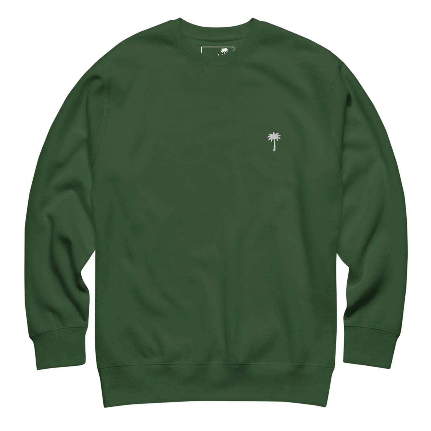 A plain, dark green Mambí crewneck sweatshirt featuring a small, white palm tree graphic on the left chest area.