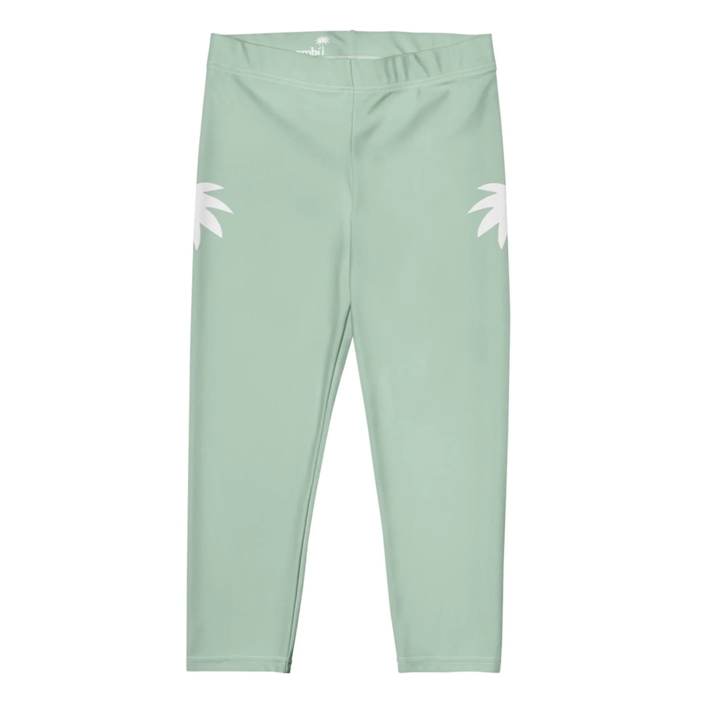 Light green childrens leggings with a simple design, featuring two white palm tree graphics near the hips. The Mambí leggings have an elastic waistband and a smooth, seamless appearance.