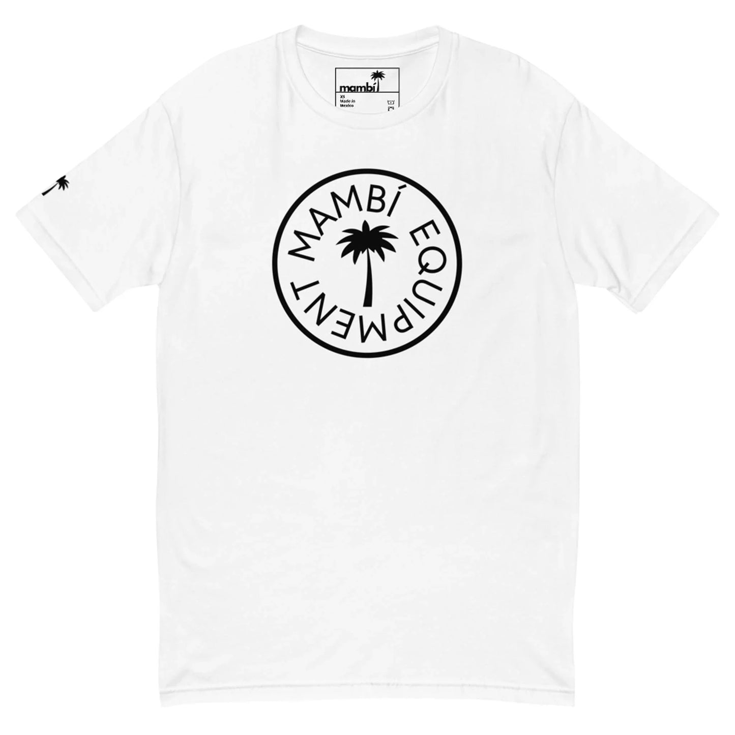 White t-shirt with a black circular Mambí logo in the center featuring the words MAMBÍ EQUIPMENT around a palm tree. A small palm tree logo is also printed on the left sleeve near the shoulder.