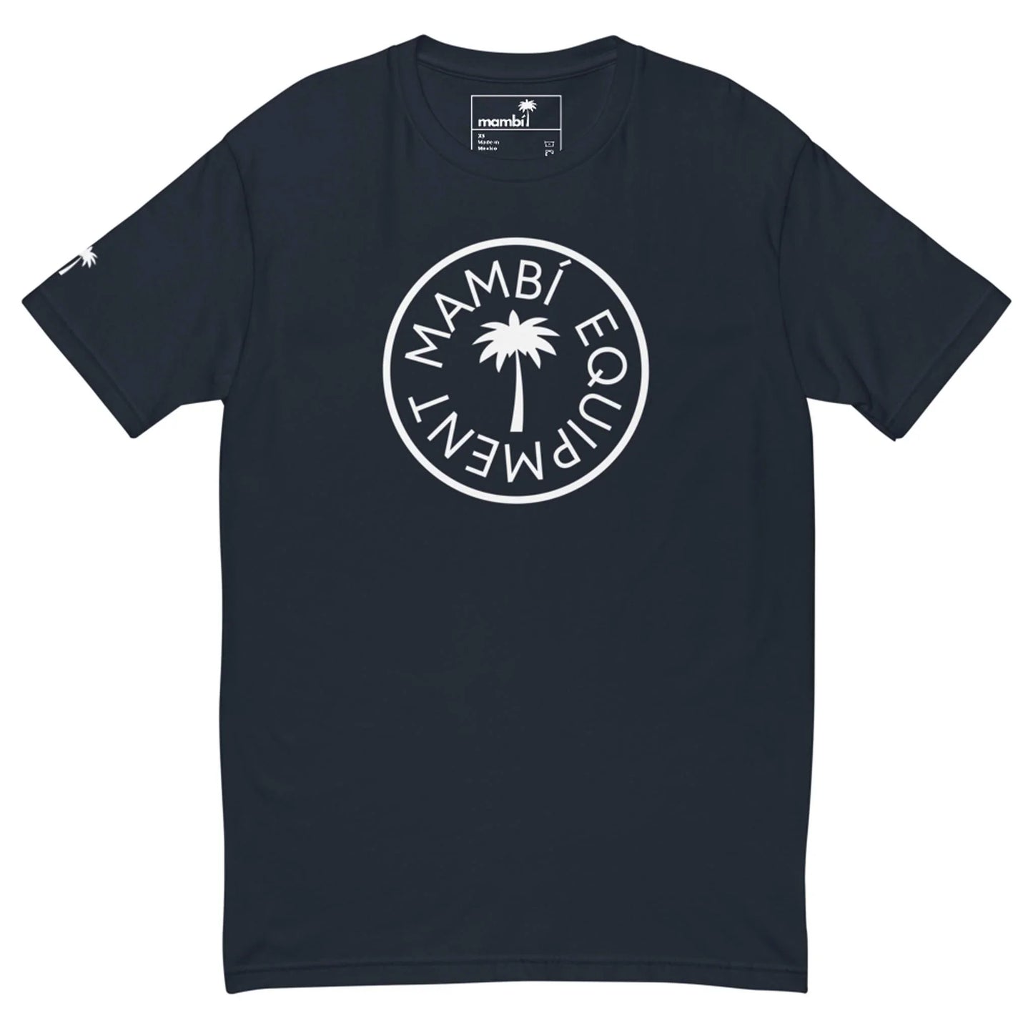 A navy blue t-shirt featuring a white circular logo with a palm tree in the center and the words Mambí Equipment around it. The left sleeve is accented with a small white palm tree graphic.