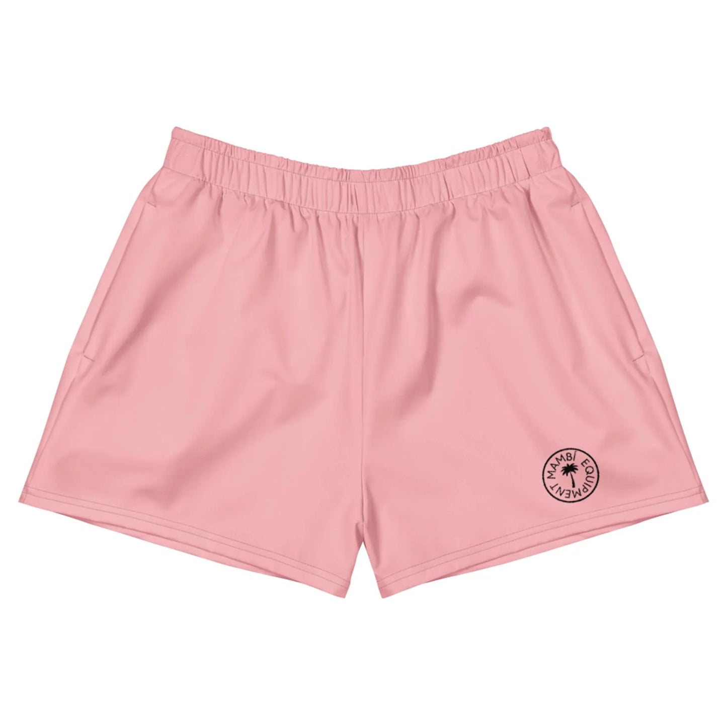 Light pink athletic shorts with an elastic waistband and a small circular Mambí Malibu Club logo in black on the lower left leg. The shorts are laid flat on a white background.