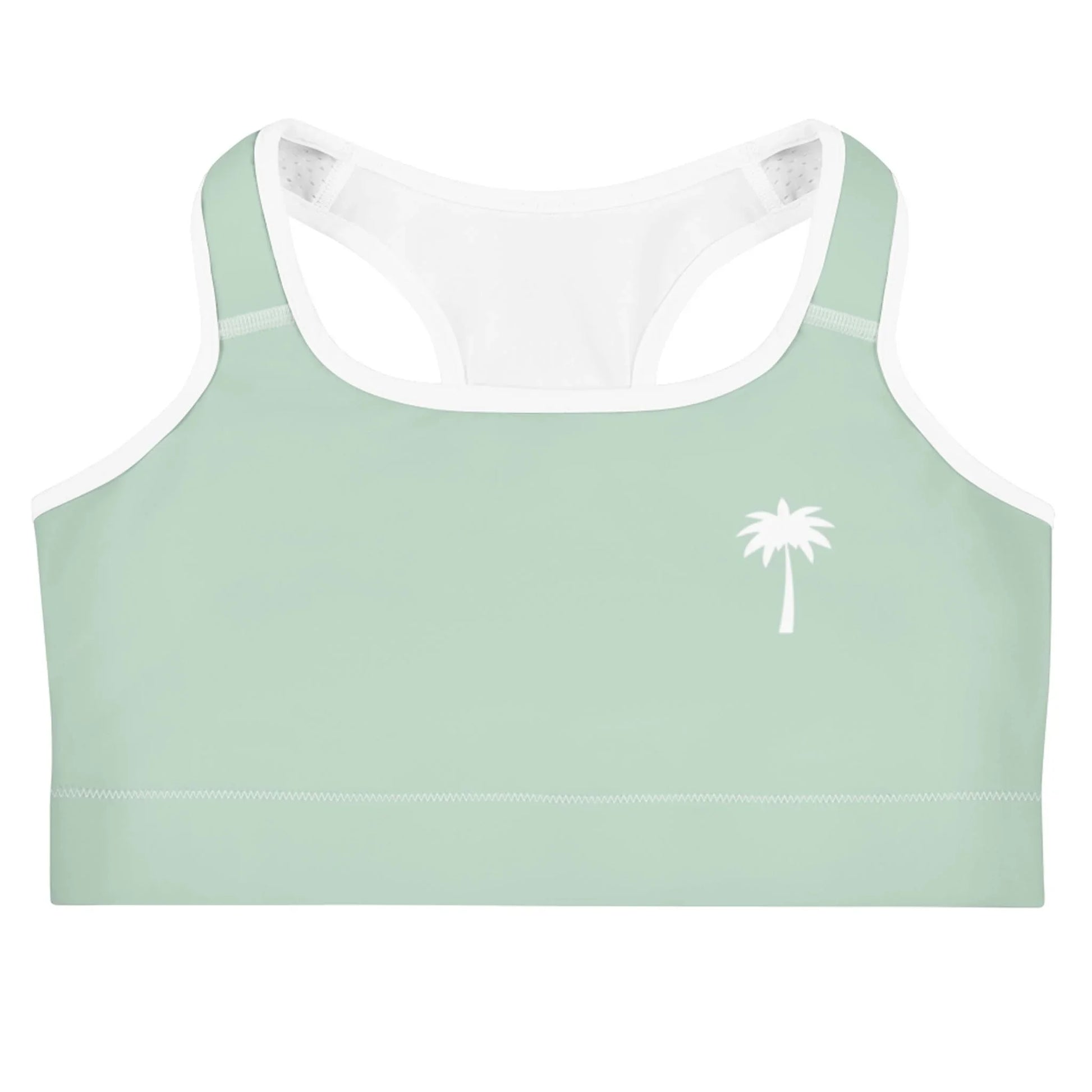 Light green Mambí sports bra with white trim and a simple white palm tree graphic on the left chest, displayed against a white background.