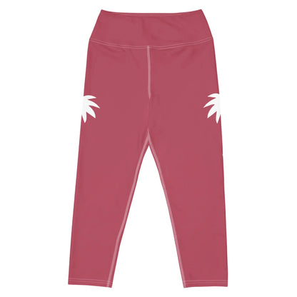 The Aventura High-Rise Yoga Capri Leggings by Printful feature a dusty pink hue with white abstract floral shapes on each hip, crafted from four-way stretch fabric. Shown from the back, theyre a must-have for your activewear collection.