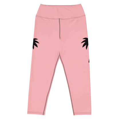 From Printfuls Aventura High-Rise Yoga Capri Leggings for women, these pink capris feature black palm tree silhouettes at the hips, visible seam stitching, and four-way stretch fabric for comfort and flexibility.
