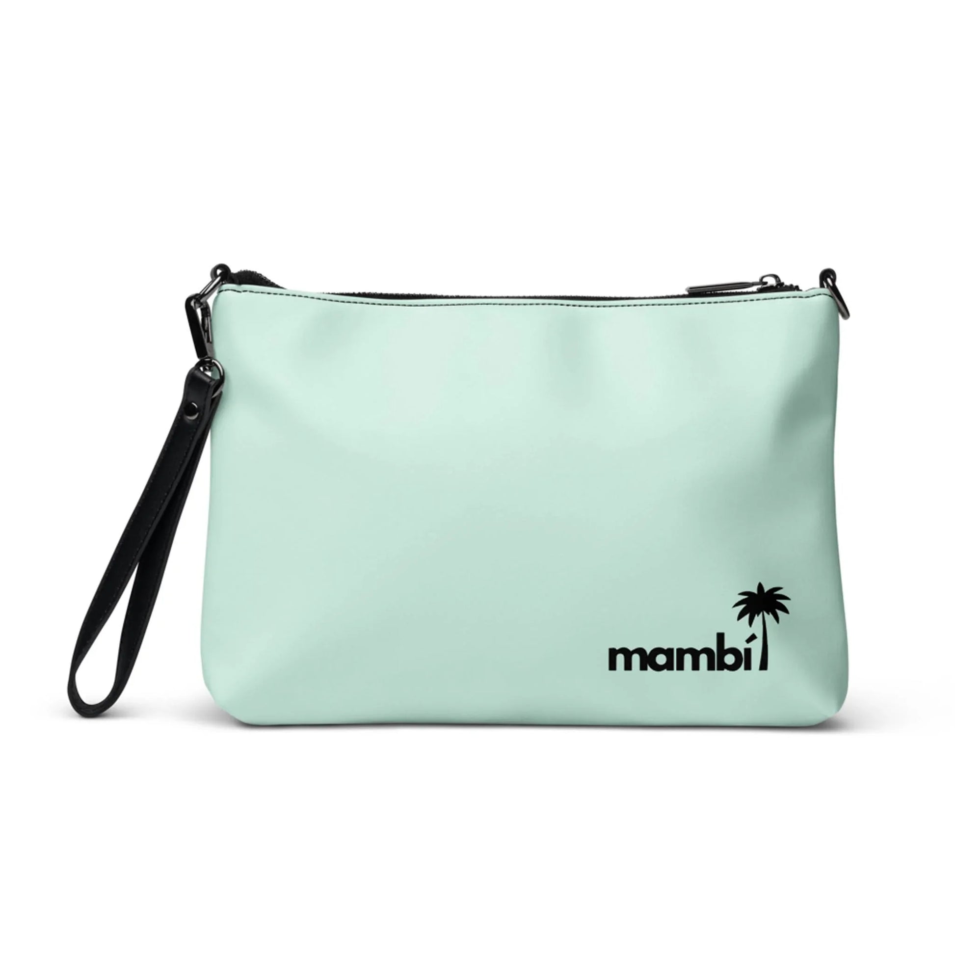 The Blake Crossbody Bag by Printful is a light blue faux leather zippered pouch with a black wrist strap, featuring mambi and a palm tree graphic in black on the lower right corner.