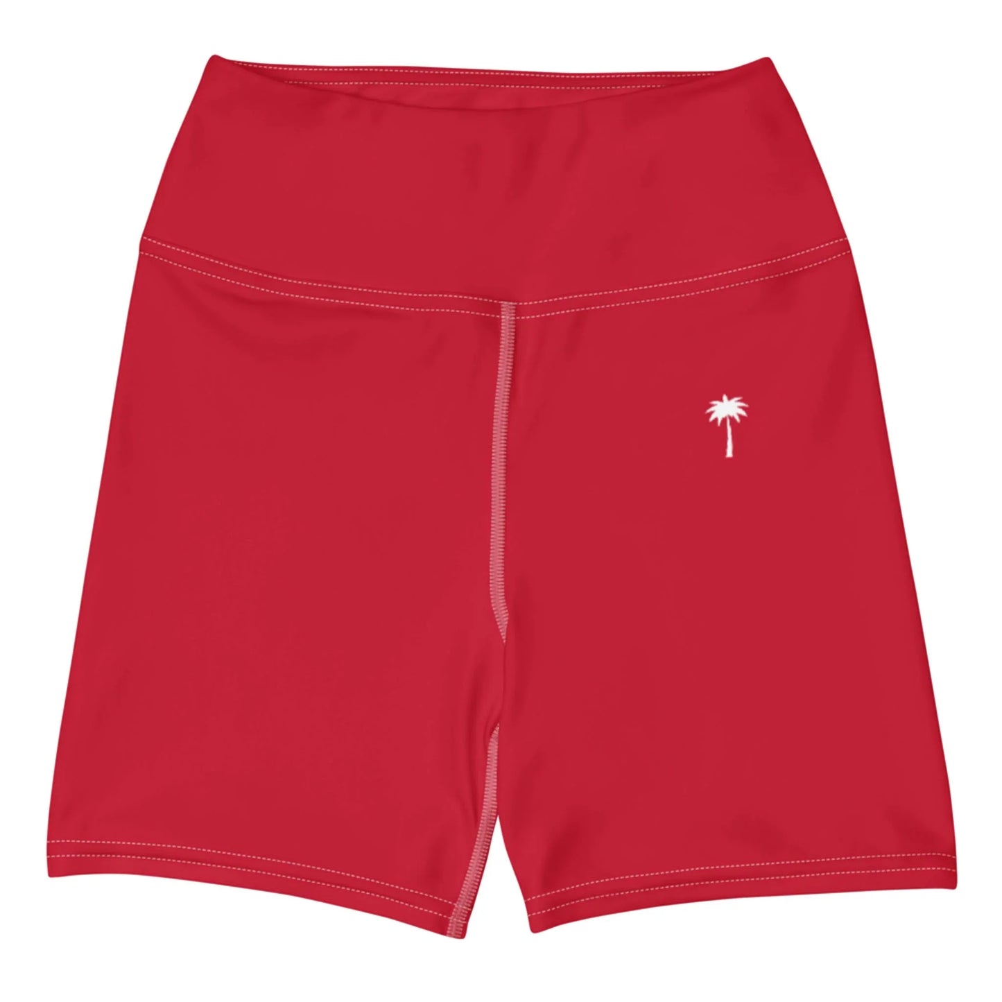 Printful Brickell Yoga Shorts for women in bright red, featuring high-waisted fit, four-way stretch, white stitching, and a small white palm tree graphic on the left leg. Shown flat on a white background.