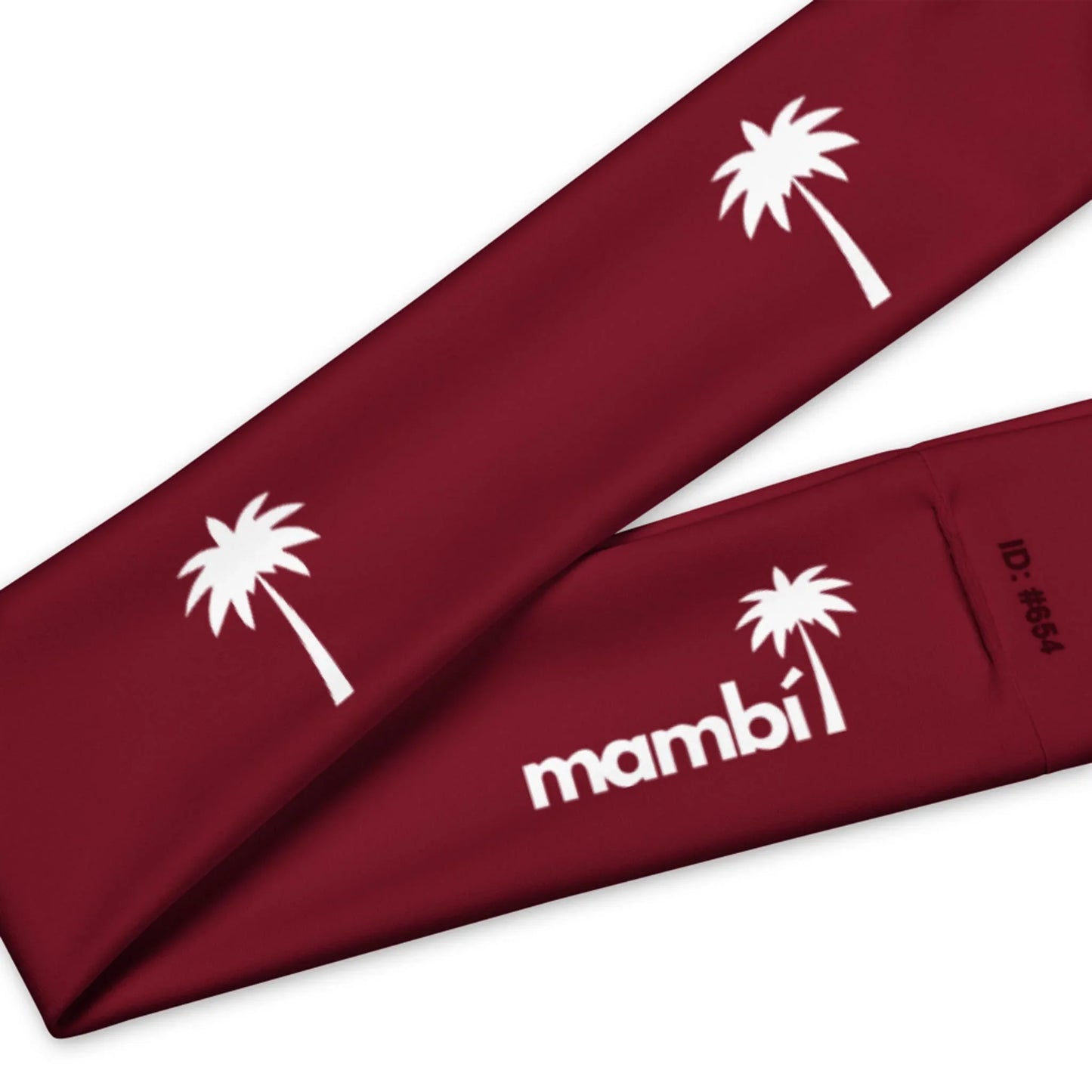 A maroon fabric features white palm tree graphics and the word Mambí, with a small ID number #664 on the side.