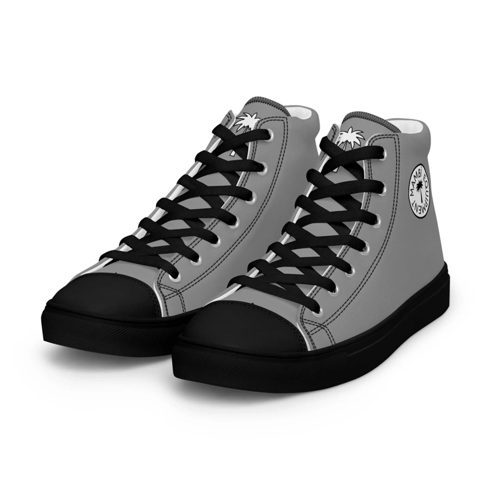 A pair of gray high-top sneakers with black laces, soles, and toe caps. Each shoe features a round Mambí logo with palm tree graphics on the outer ankle area.