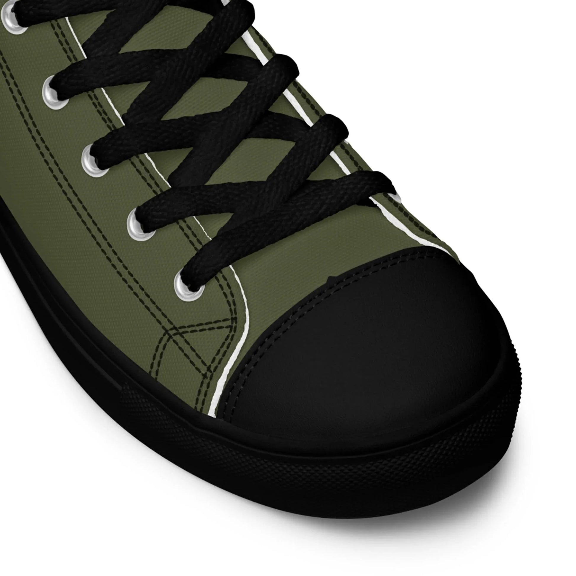 Close-up of the Carlito Sastre Vintage Hi-Top Sneakers by Printful, showcasing black laces, toe cap, and rubber sole with white stitching and eyelets on an olive green upper in a classic mens hi-top design. Color: Black/Saratoga.