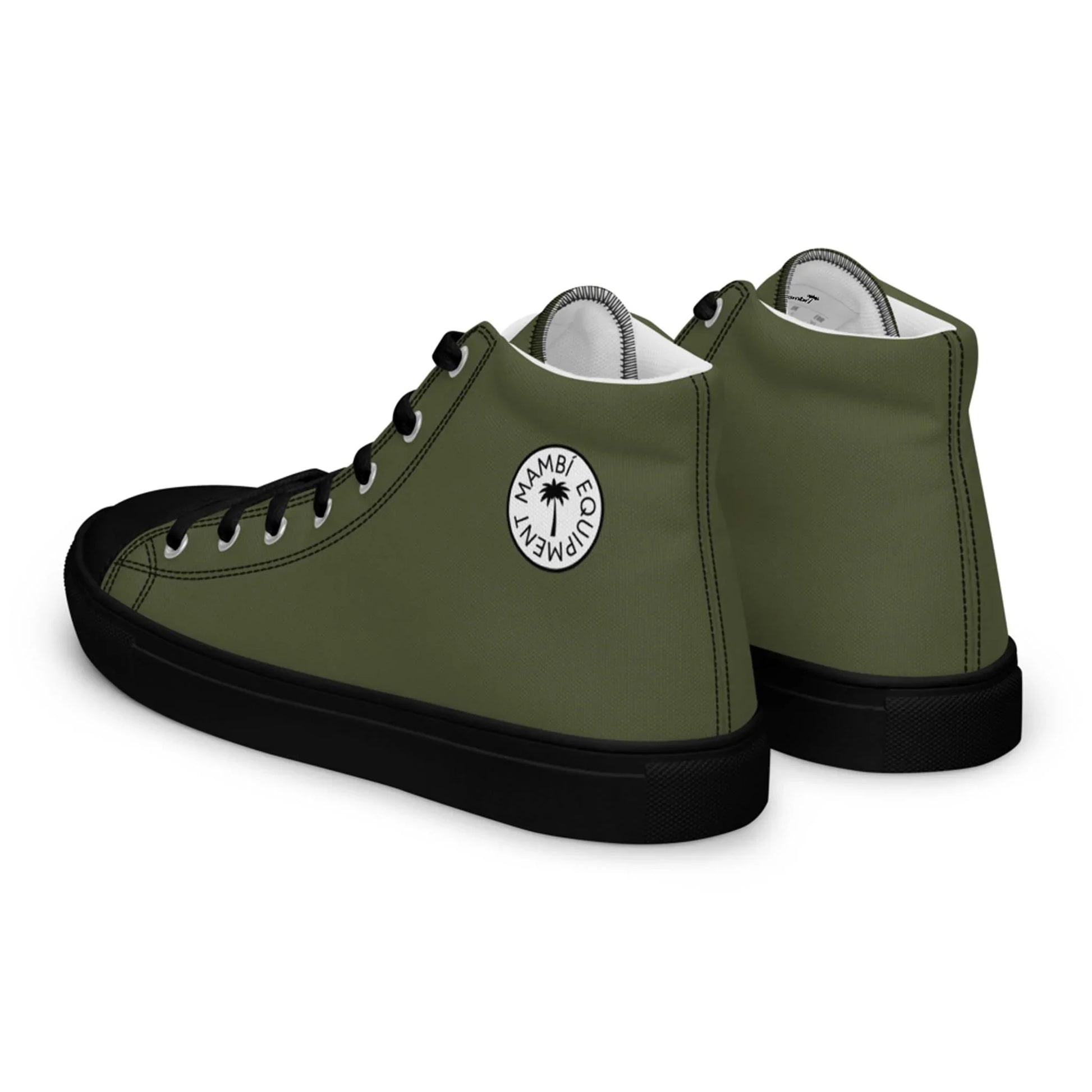 A pair of Carlito Sastre Vintage Hi-Top Sneakers by Printful in Black/Saratoga, featuring retro canvas uppers, black soles and toe caps, plus a round palm tree logo—classic style inspired by Carlos Sastre’s laid-back vibe.