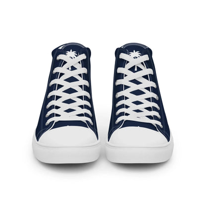 The Carlito Sastre Vintage Hi-Top Sneakers by Printful for men feature a navy and white canvas design with white laces, toe caps, and soles. Each tongue displays a palm tree motif, as seen from the front view.