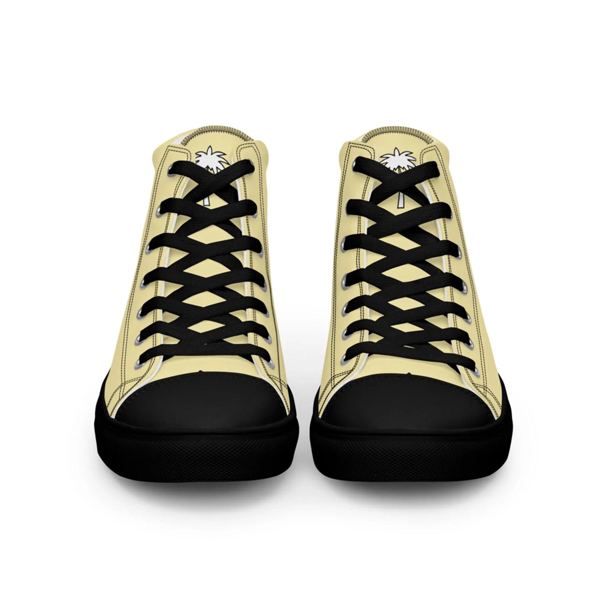 The Carlito Sastre Vintage Hi-Top Sneakers by Printful for men feature black soles and laces, banana mania (beige) canvas uppers, and palm tree graphics on the tongues. Shown from the front.