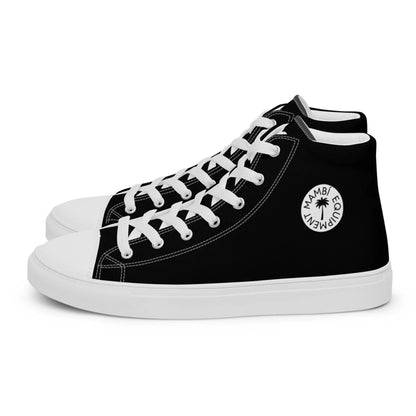 The Carlito Sastre Vintage Hi-Top Sneakers by Printful feature black canvas, white soles, laces, and stitching, plus a circular palm tree MAMBI EQUALITY logo on the side. Designed for women in a classic white/black colorway.