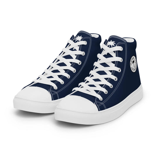 The Carlito Sastre Vintage Hi-Top Sneakers by Printful for women feature a navy and white canvas design with white laces, soles, and a circular palm tree logo on the side.