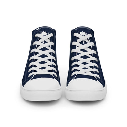 The Carlito Sastre Vintage Hi-Top Sneakers by Printful for women feature a classic navy and white design with white laces, toe caps, and soles, and a small palm tree motif on each tongue, shown from the front.