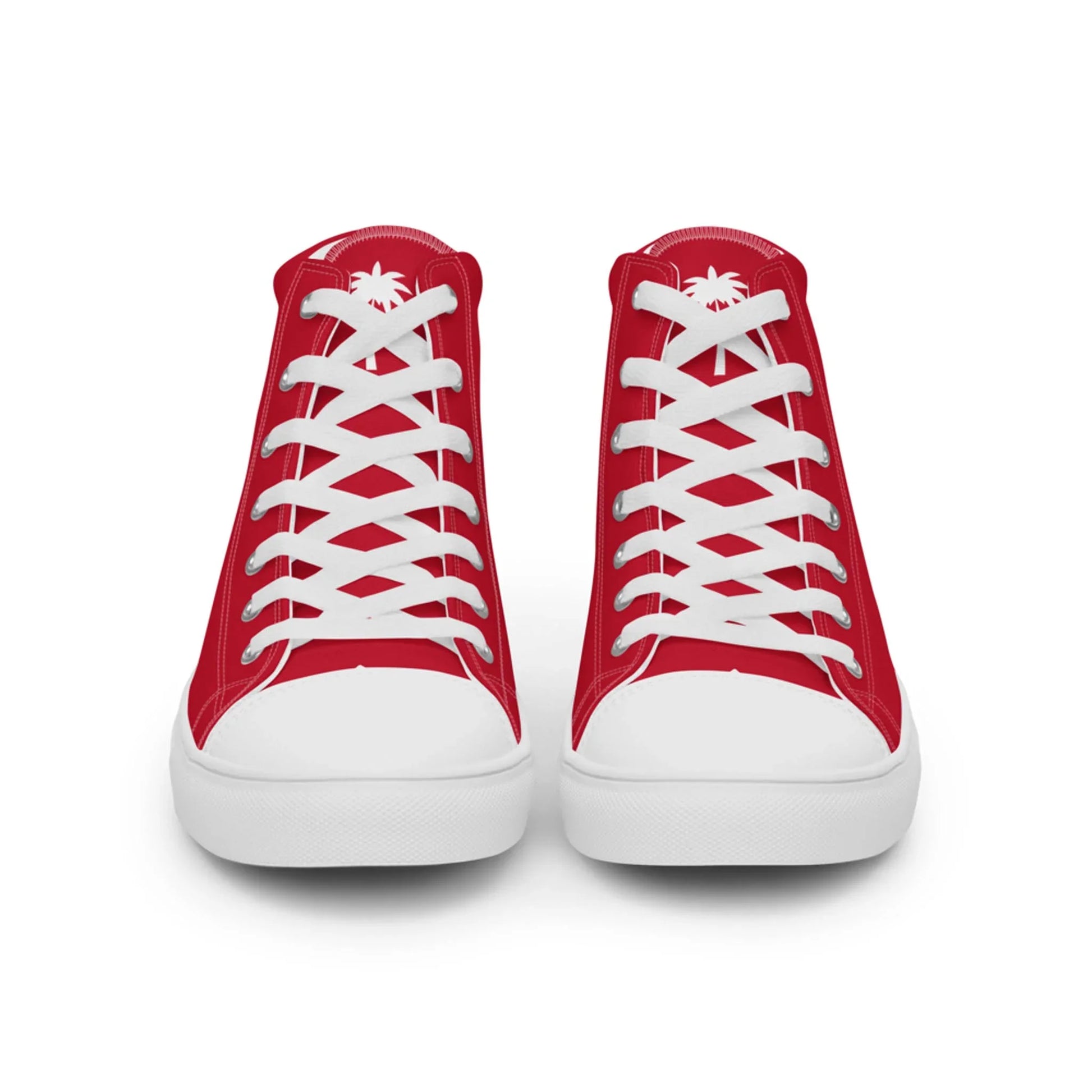 A pair of red high-top Mambí sneakers with white laces and soles, viewed from the front. The tongue features a small white palm tree graphic.