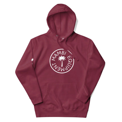 A maroon Mambí hoodie with a white circular logo featuring a palm tree and the words MAMBI EQUIPMENT; a small palm tree also accents the right sleeve.