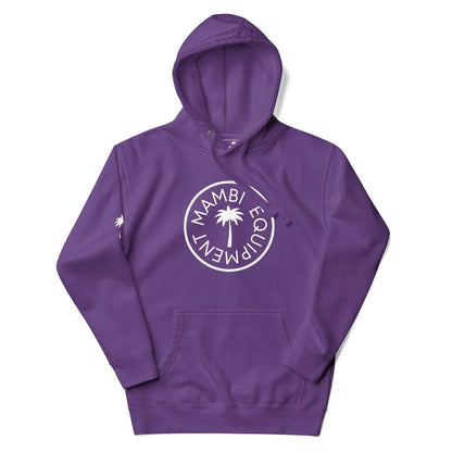 A purple hoodie with a front pocket and hood, featuring a white circular Mambí Equipment logo with a palm tree on the chest, and a small white palm tree on the left sleeve.