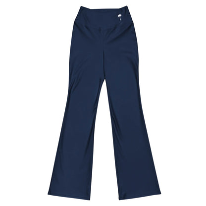 The Carolina Flared Performance Leggings by Printful are navy blue, high-waisted yoga pants with a butt-lifting fit and wide-leg style, featuring a small white palm tree logo near the waistband. Laid flat on a white background.