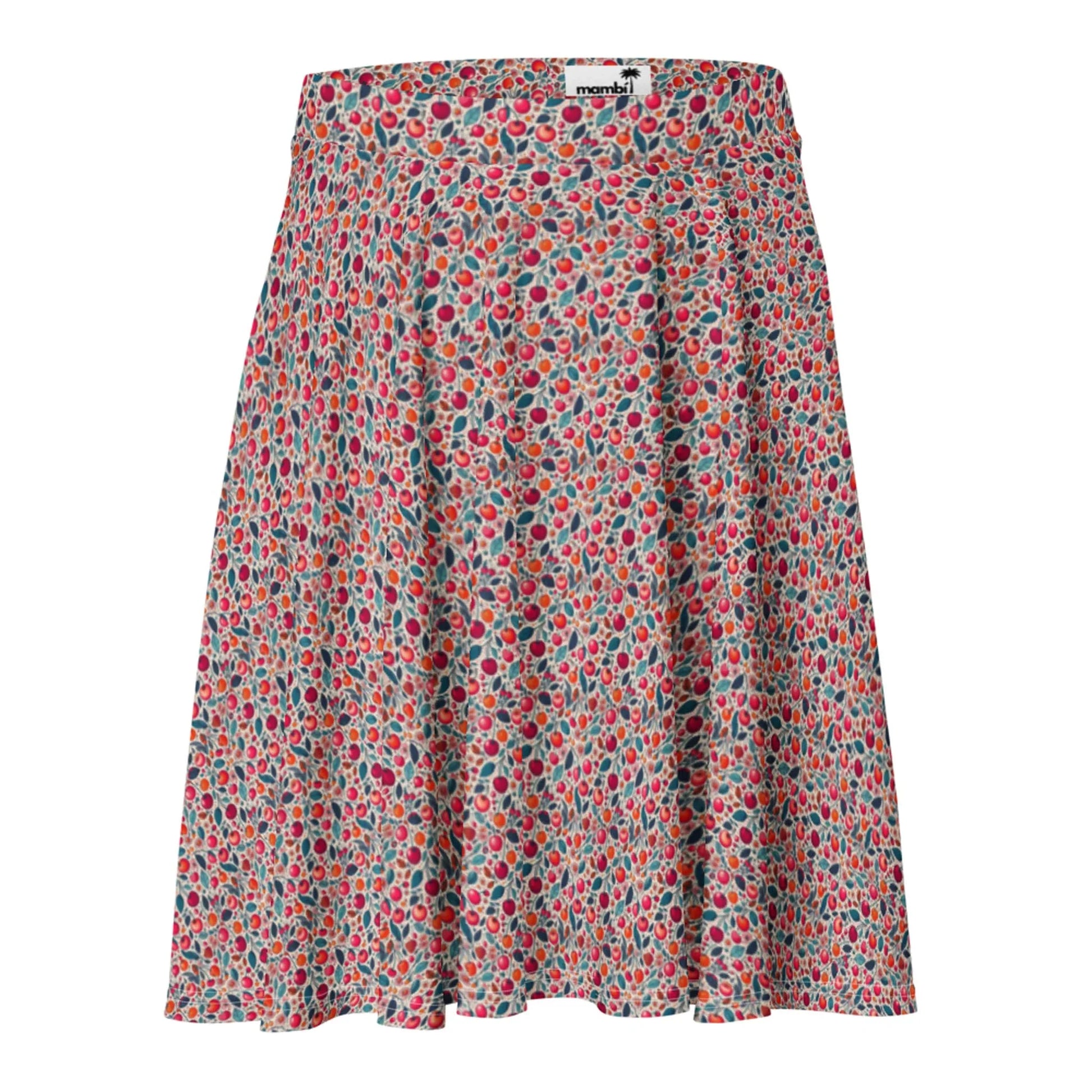 A knee-length, flared Mambí skirt with a multicolored dotted pattern in red, teal, and white on a light background. It features a wide waistband and a loose, flowing fit.